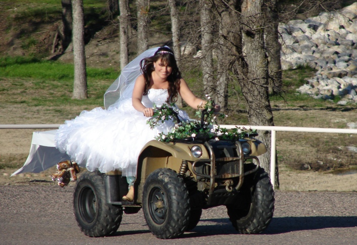This bride at Myers Park chose to meet her groom at the altar by 4wheeler